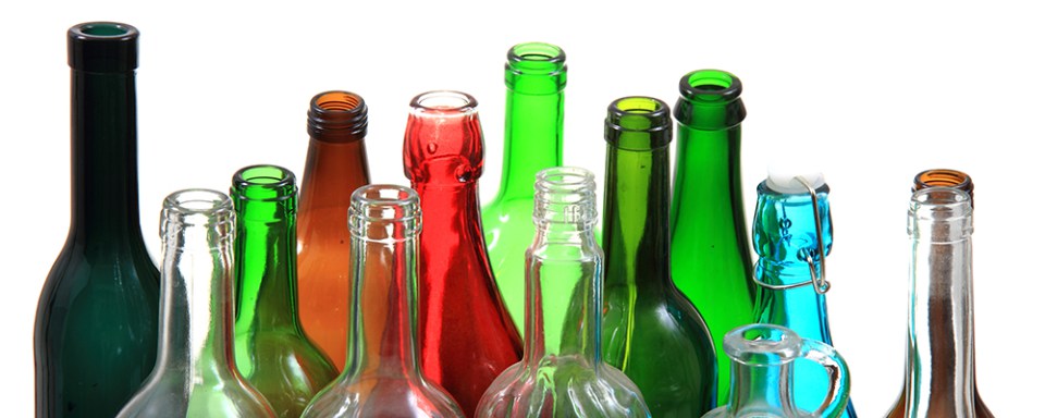 empty color glass bottles isolated on the white background